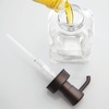 image:imagemDesign Square Glass Refillable Liquid Soap Dispenser Pump Bottle for Bathroom Vanity Countertop Kitchen Sink  Holds Hand Soap Dish Soap Hand Sanitizer Essential Oils  2 Pack  ClearBronzeClearBronze